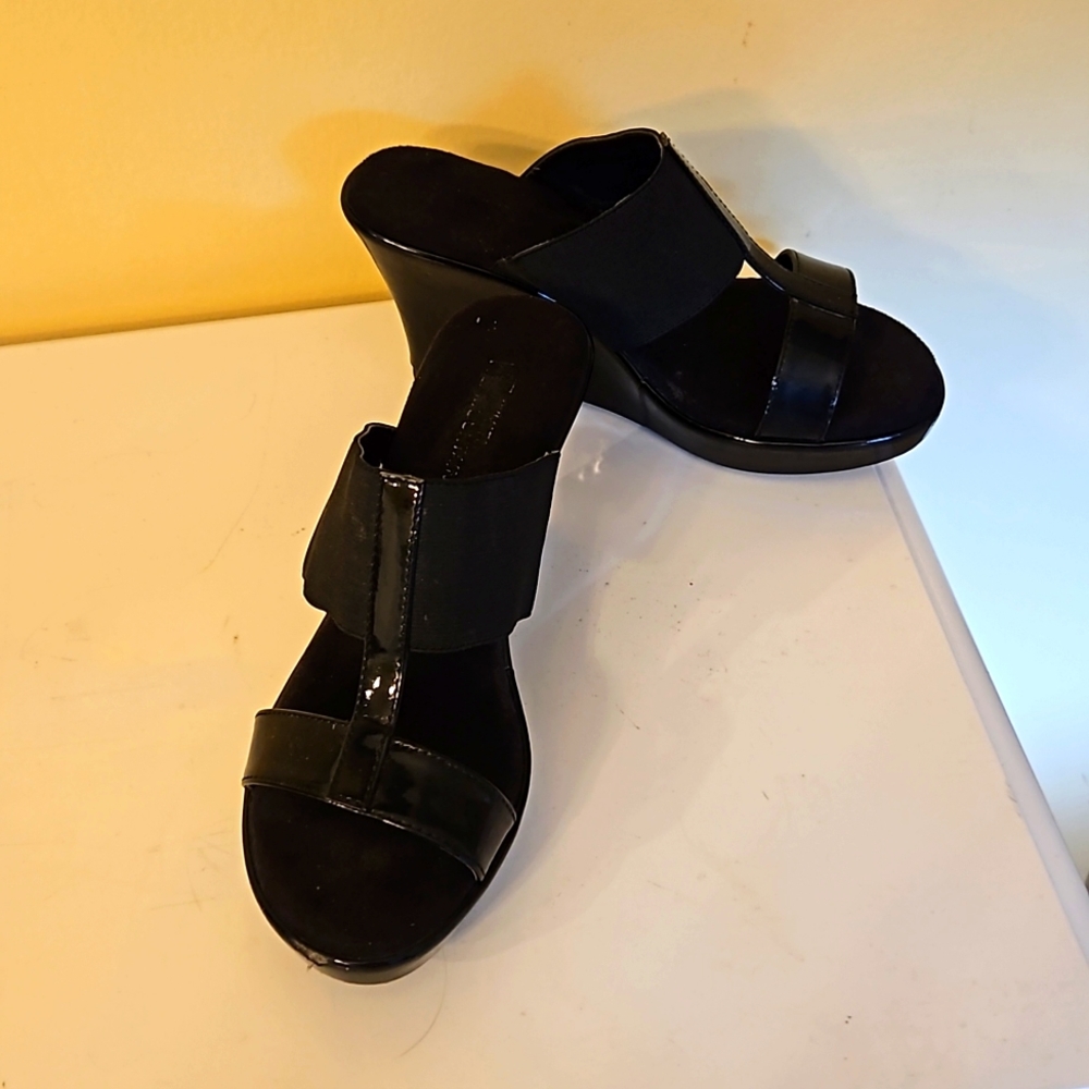 Black Patent wedge sandal.